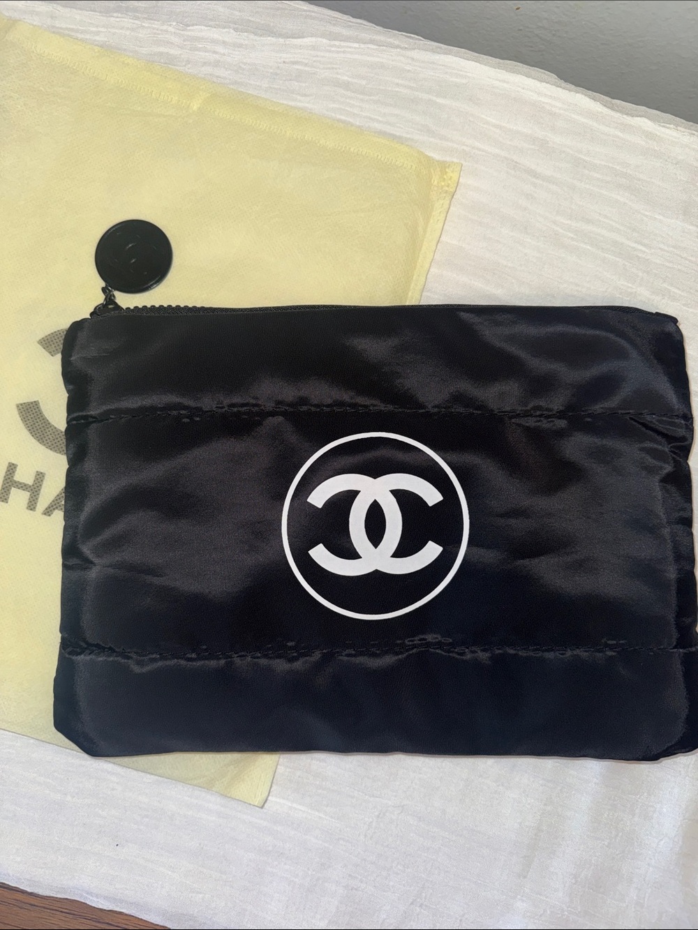 CHANEL Black Nylon Quilted Zip Pouch with Logo Charm